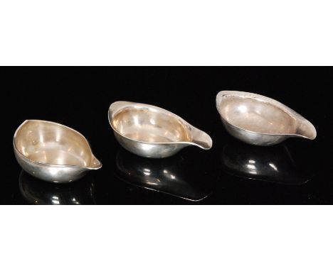 A George III hallmarked silver pap boat of plain reeded form, the base inscribed 'The Gift of Mr Peter Carter to his Grandson