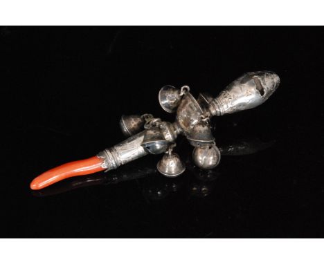 A Georgian silver baby's teething rattle and whistle, with embossed C scroll and foliate engraved decoration, two tiers each 
