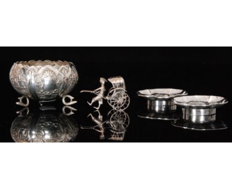 A pair of Chinese silver circular dishes, each with six petalled scalloped edge and engraved with a crane seated on blossomin