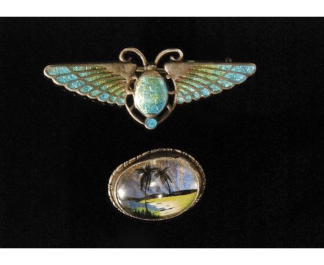An early 20th Century Charles Horner silver and enamel winged scarab beetle brooch, with graduated turquoise and to green ena