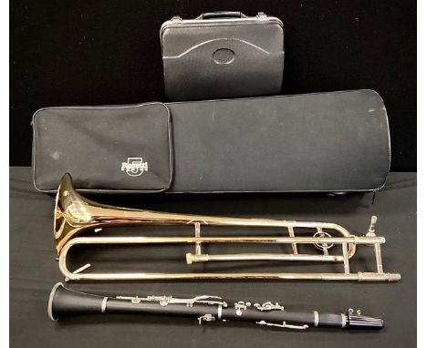 Musical Instruments - A Rosetti series 5, 89TBL Trombone, cased, with mouth-piece;  a cased ‘Jazz’ Clarinet, (2). 