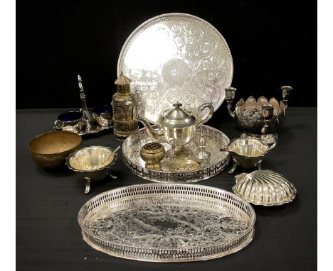 Metal ware including; galleried trays, a three piece Sheffield silver plated tea set, Viners posie and candlestick bowl, silv