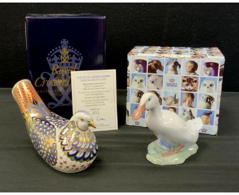 A Royal Crown Derby paperweight, Millennium Dove, Govier's exclusive, limited edition of 653/1500, gold stopper, boxed with c