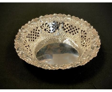 A late Victorian silver bonbon dish pierced and embossed rim, Fenton Brothers, Sheffield 1894, 11.3cm diameter, 57.6g gross 