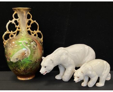 A Charisme model of a Polar Bear, another Melba, twin handle vase painted with a Stork, indistinctly signed,  (3) 