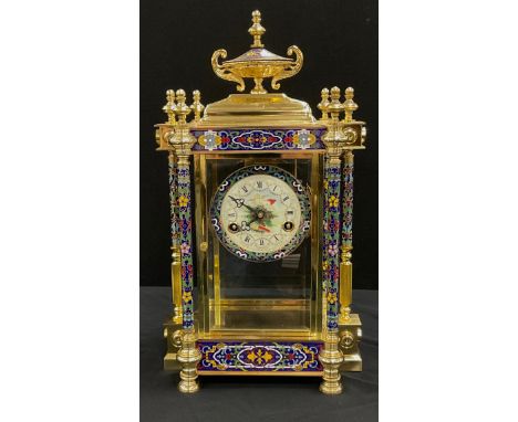 A large modern French champleve enamelled four glass mantel clock, Cherubic dial, floral bands and columns in blue, yellow, r