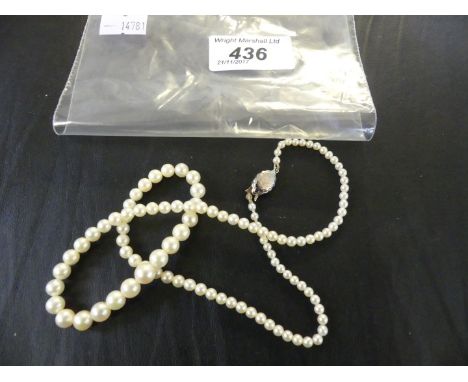 A graduated pearl necklace, to silver clasp