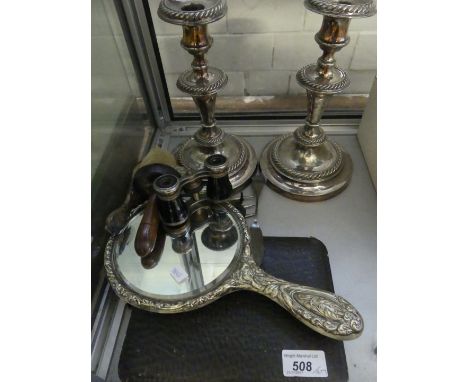 A mixed lot comprising a pair of Elkington & Co silver-plated circular candlesticks, together with further silver-plated back