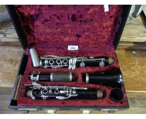 A cased Boozey & Hawkes clarinet, fitted in case.