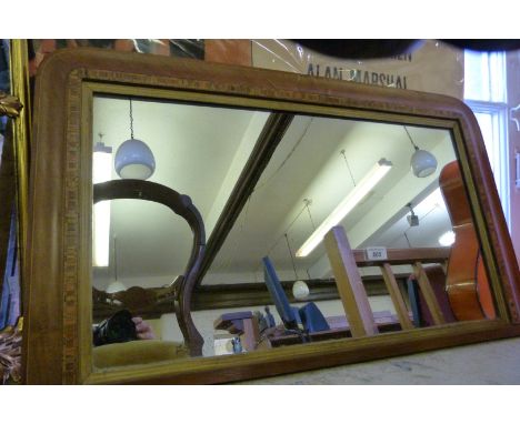 Late 19th early/20th Century walnut over mantel mirror.