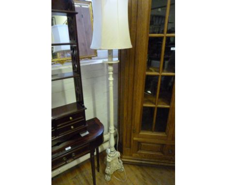 A white painted Marie Antoinette style standard lamp.