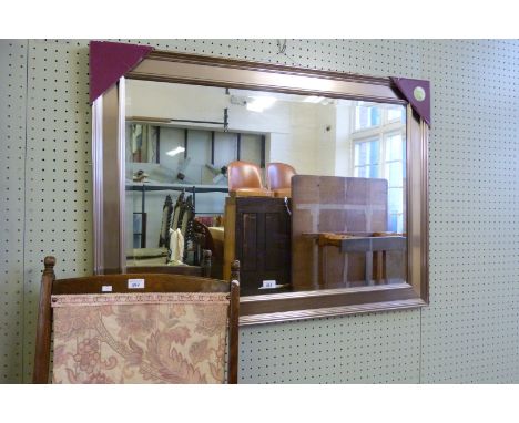 A good quality modern silver framed bevelled edged wall mirror.