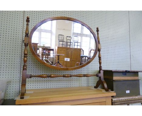 A good quality reproduction yew wood dressing table mirror.