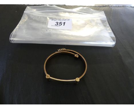 A 9k tri-coloured gold bangle, weight approx. 13.8g