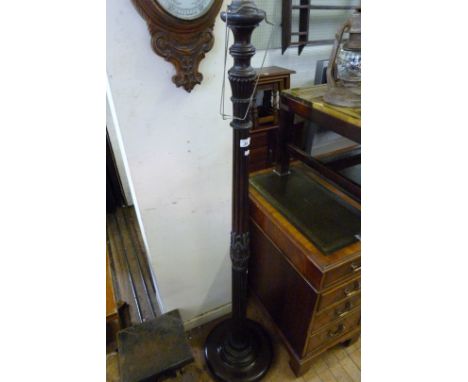 A decorative early 20th Century beech standard lamp (sold electrically untested).