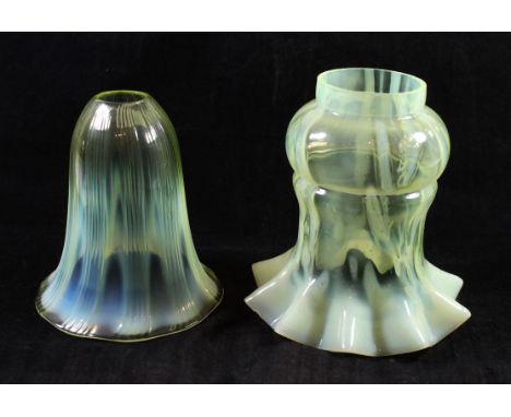 A late 19th/early 20th Century vaseline glass light shade of frilled formTogether with a further ribbed bell shaped example, 