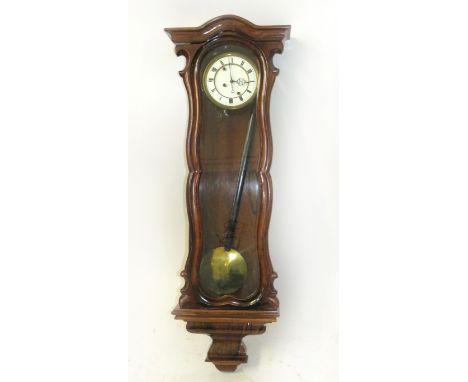 A good quality 19th Century Vienna wall clock with circular white enamel dial With Roman numerals, unsigned to a brass moveme