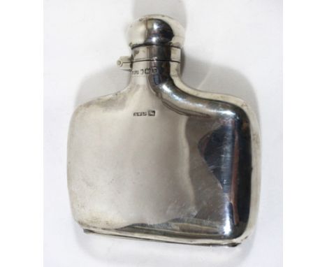 An Edward VII silver hip flaskOf squat rectangular form, the flask with spherical hinged lid, Henry Williamson Ltd., Sheffiel