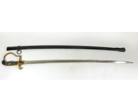 A German Officers sword, early 20th Century77cm curved single edged single fullered blade marked Eickhorn Solingen, gilt meta