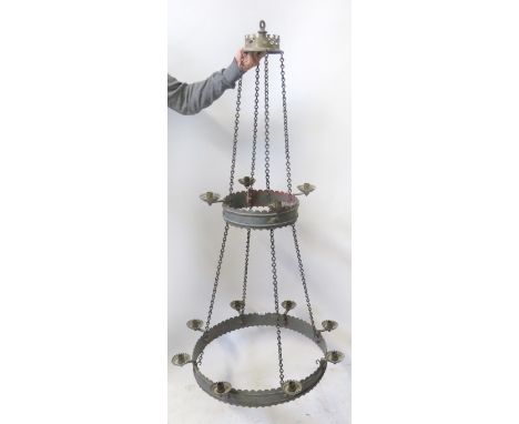 A good Arts & Crafts Gothic style brass and iron two tier twelve light chandelier In the style of Pugin, largest diameter 62c
