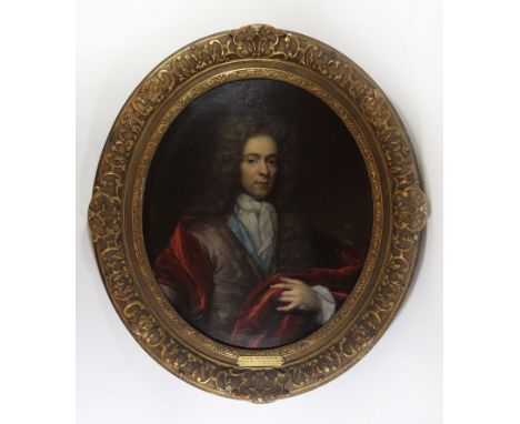 Attributed to Arnold Van Boonen (Dutch 1669-1729) - Half length  portrait of a gentleman.Inset into an oval gilt frame, bears