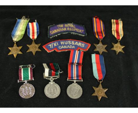 A collection of WWII medalsTo include 1939-45 star, Africa star, Atlantic star, France and Germany star, Burma star, 1939-45 