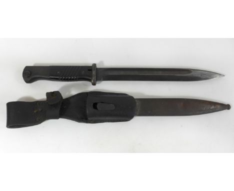 A Nazi German WWII period S84/98 bayonet 25cm single edged single fullered blade stamped E.U.F Horsten, with bakelite grips, 