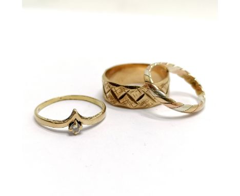 3 x gold rings - the 3 colour gold (unmarked) plaited ring is size K, white stone set wishbone size O½, zig zag decorated ban