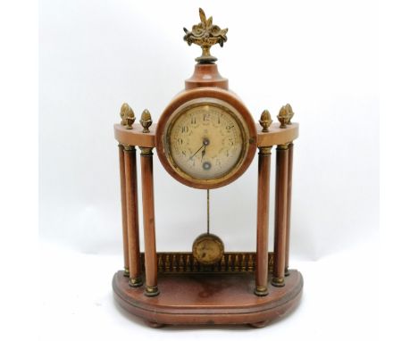 Small antique walnut portico clock with gilt brass mounts, original key and pendulum. Running. 30cm high