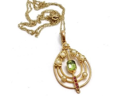 Antique 9ct marked gold Art Nouveau pendant set with peridot / ruby / pearl (3.5cm drop and missing detail to bottom of penda