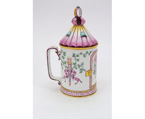 A Gien France 'lantern' cylindrical tankard, the sides with a central floral panel flanked by ribbon tied quiver of arrows, w