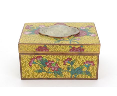 A Chinese cloisonné enamel rectangular box, circa 1900, the pull-off cover set with a foliate carved and pierced jade panel, 