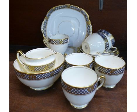 A Taylor and Kent, Longton six setting tea service, one cup a/f