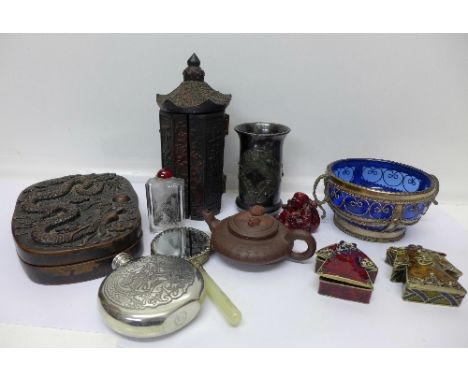 A terracotta teapot, two enamelled Chinese costume trinket boxes, a scent bottle, a box decorated with a dragon, a vase, a fl