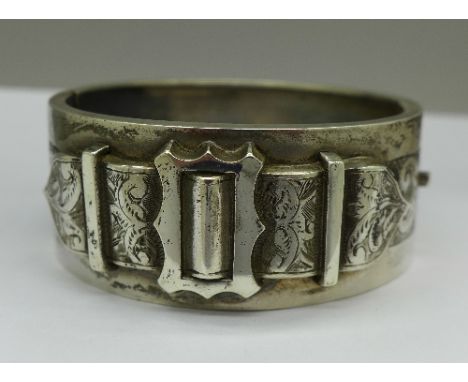 A Victorian buckle decorated bangle, Birmingham 1886, width 27mm