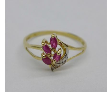 A 9ct gold, ruby and diamond ring, 1.0, N
