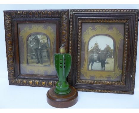 A trench art lighter and two framed photographs of soldiers