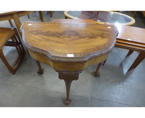 A George I style mahogany demi-lune card table 