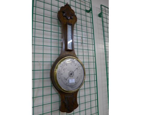 An oak aneroid banjo barometer 