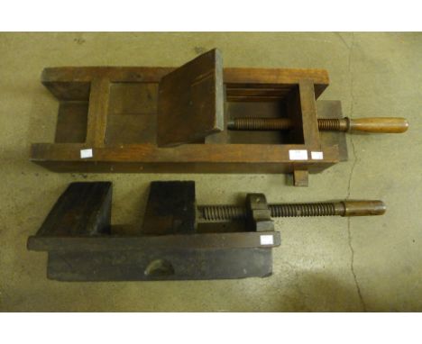 Two large vintage wooden clamp vices 