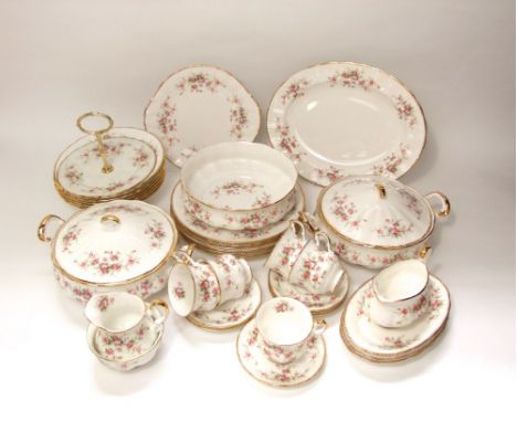 A quantity of Paragon china Victoriana Rose pattern dinner wares comprising a pair of tureens and covers, an oval meat plate,