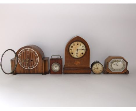 Mixed collection of four time pieces to include an Edwardian lancet clock, a Smiths of Enfield walnut veneered two train mant