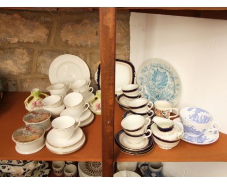 A collection of Royal Worcester ceramics including an outsized cup and saucer with blue dragon decoration, a 1911 Coronation 