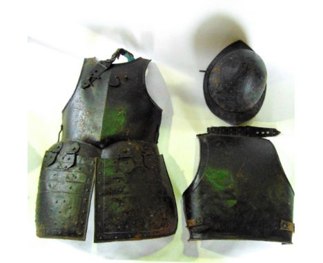 Medieval style iron body armour with helmet.