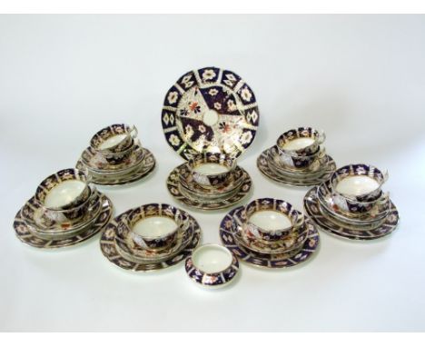 A collection of 19th century tea wares with painted and gilded Imari type decoration in the Royal Crown Derby manner comprisi