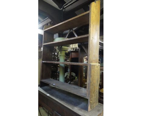 A 19th century pine four tier book shelf of tapering form