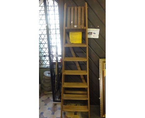 A stripped and waxed pine step ladder