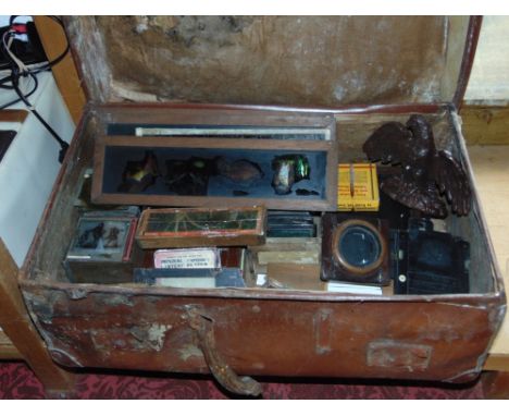A box containing a large collection of Magic Lantern glass slides and others and a Magic Lantern type equipment.