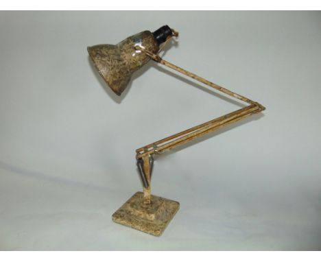A Herbert Terry anglepoise lamp with original mottled paint. 