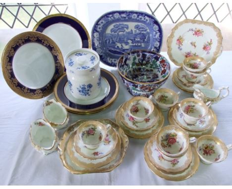 A collection of Hammersley tea wares with printed and infilled floral sprays and gilt border comprising a pair of cake plates